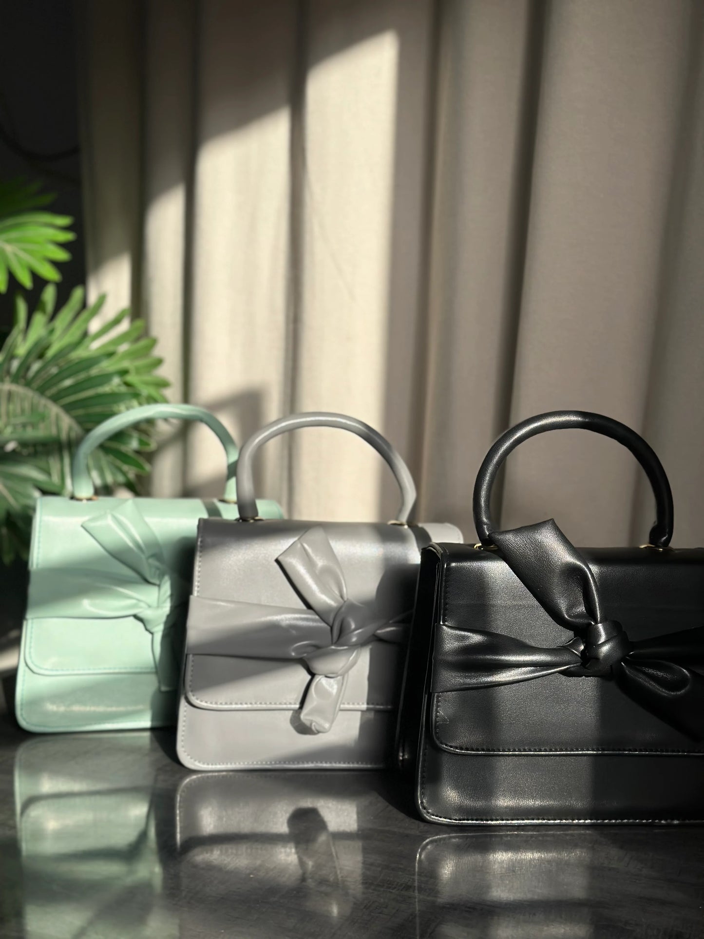 ELLEKNOT - CYAN HANDBAG