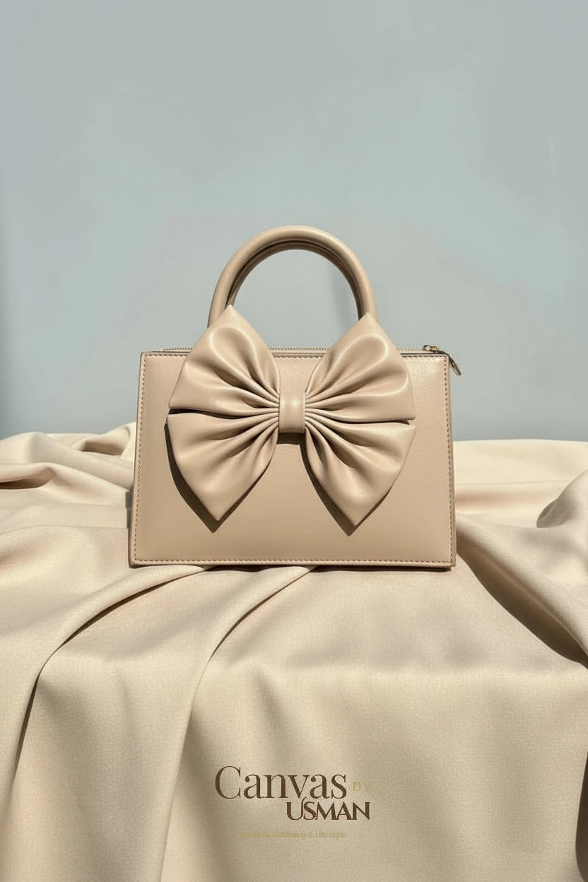 GLOSS BOW HANDBAG - BEIGE