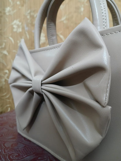 GLOSS BOW HANDBAG - BEIGE