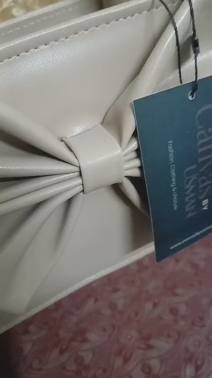 GLOSS BOW HANDBAG - BEIGE